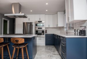 This project, completed by Murdock Construction, features our AART shaker cabinet door in Chantilly Lace and Gentleman’s Grey.